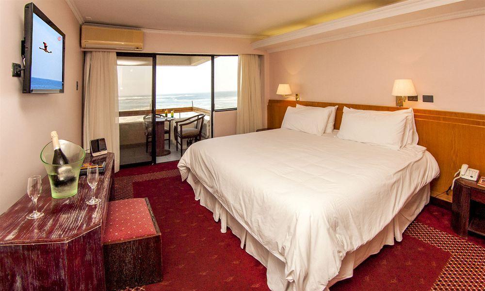 Hotel Gavina Costa Mar Iquique Buitenkant foto A room at the hotel